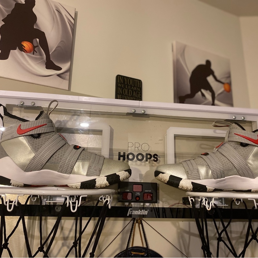 A excellent condition pair of LeBron’s soldiers 11 silver bullets size 11